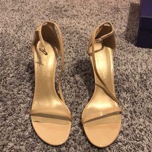 Stuart Weitzman nude color heels.